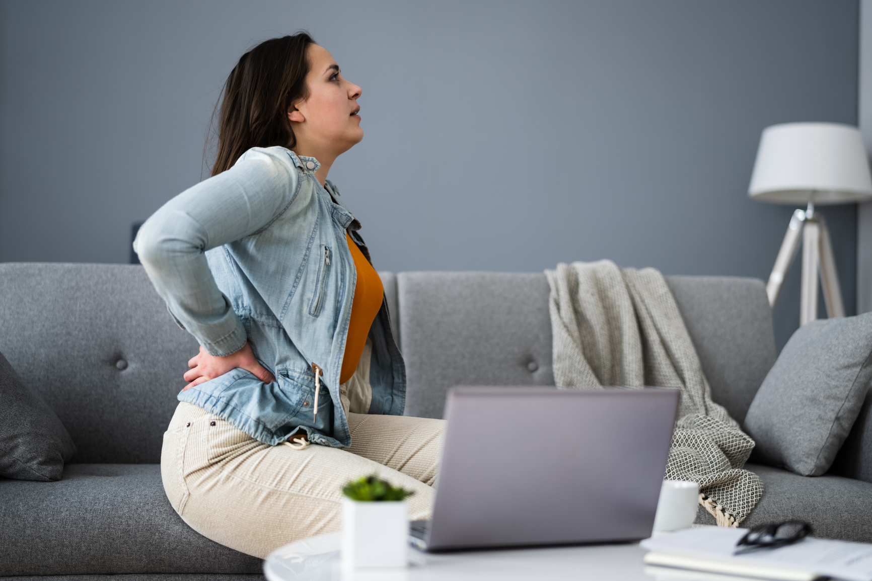 Lower Back Pain. Bad Posture Sitting