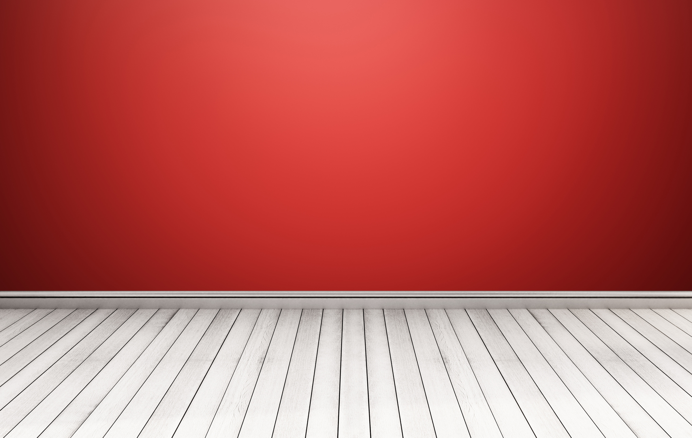 White wood floor with red wall